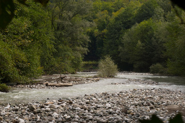 Abkhazia. Jeep trip to the mountains. The Gega waterfall, lake Riza