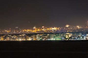 New Years Eve January 01 2020 fireworks at Thessaloniki, Greece.Part of the celebrations for the coming of new year with pyrotechnics at Aristotelous square area, seen from the city waterfront.