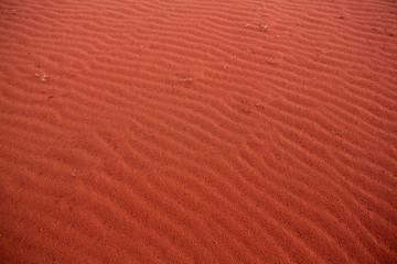 Wadi Rum Desert in Jordan. On the Sunset. Panorama of beautiful sand pattern on the dune. Desert landscape in Jordan.