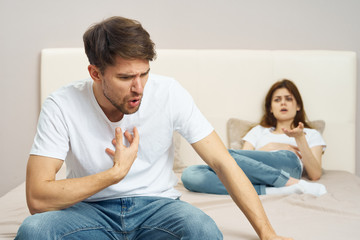 couple sitting on sofa at home