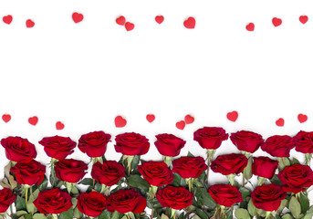 Fototapeta na wymiar Decoration of Valentine Day. Frame of beautiful flowers red roses and red hearts with space for text on white background. Top view, flat lay