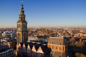 Aerial view over the Dutch city Groningen and the medieval Martini tower, seen from the roof of the Forum - obrazy, fototapety, plakaty