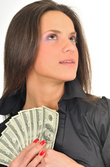 Woman holds dollar bills in her hands