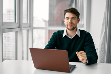 businessman working on his laptop in office