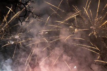 Nice colorful fireworks on night dark sky. New years eve celebration. Ceske Budejovice, Czech republic