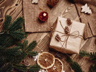 christmas gingerbread cookies and spices on wooden table
