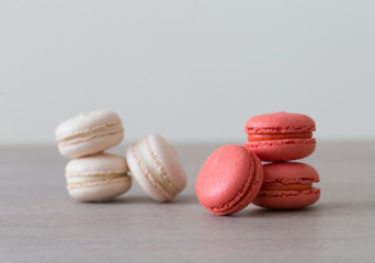 Food. macaroons red and white, beige background