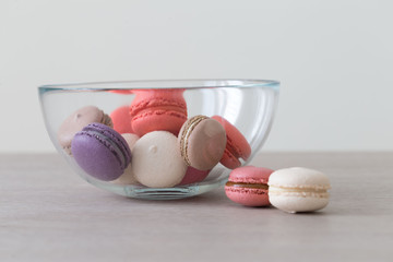 Food. macaroons сolorful, beige background