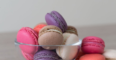 Food. macaroons сolorful, beige background
