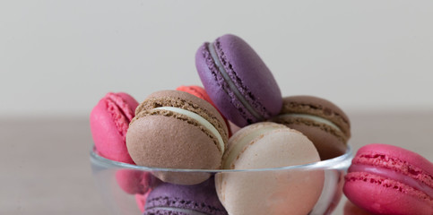 Food. macaroons сolorful, beige background