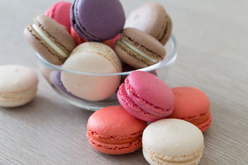 Food. macaroons сolorful, beige background