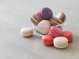 Food. macaroons сolorful, beige background