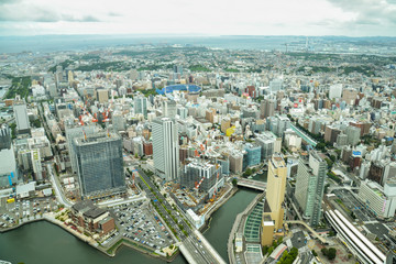 Yokohama, Japan - June 2019:.Landmark Tower View over the skyline of Yokohama and Tokyo Bay on a...