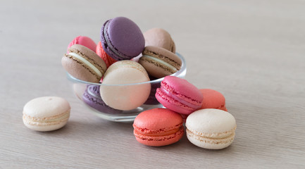 Food. macaroons сolorful, beige background