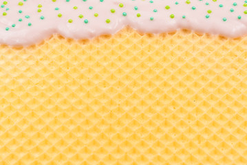 Sweet waffle background with cream.