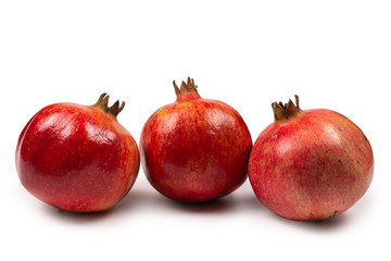Sweet pomegranate isolated on white background.