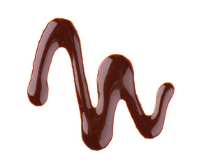 Chocolate syrup drizzle isolated on white background. Splashes of sweet chocolate sauce. Top view.