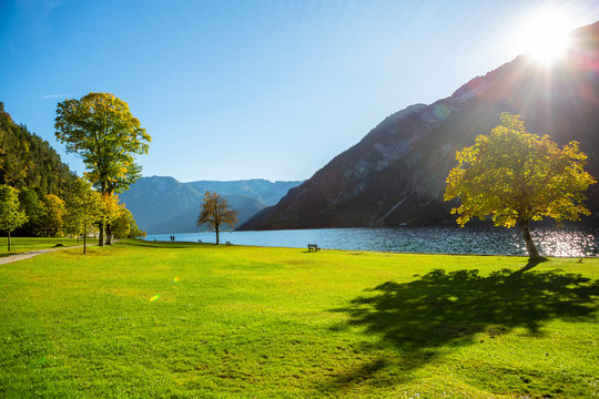 Shore of beautiful Achensee lake, Austria on sunny summer day with blue sky, Karwendel mountain range, Tyrol, Austria