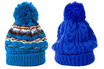 Two blue winter knit ski hat isolated white