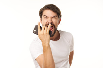 young man talking on the phone isolated on white