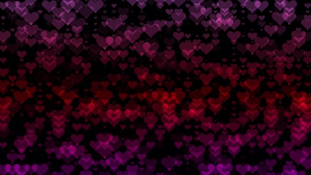 Heart wallpaper with red and pink hearts against a black background for copy space, text, title page, concert, stage - can be looped seemlessly and infinitely