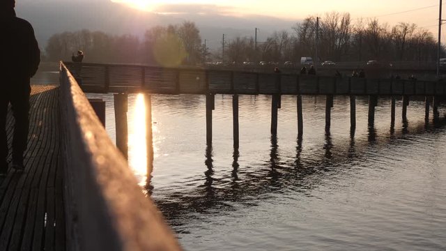 Sunrise reflection on the footbridge of Rapperswil Jona Switzerland