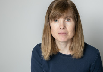 close up of middle aged woman with no makeup