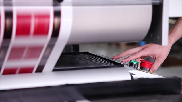 newspaper being printed offset printing press