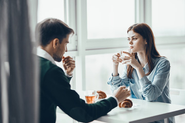 woman and man talking on the phone