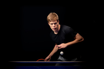 Portrait of young man playing tennis