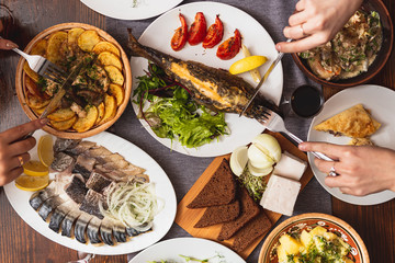 A generous and hospitable table with Ukrainian national traditional vegetable and meat dishes served to the New Year holidays, Christmas, Easter and treats for friends birthday. Top view