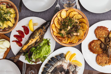 A generous and hospitable table with Ukrainian national traditional vegetable and meat dishes served to the New Year holidays, Christmas, Easter and treats for friends birthday. Top view