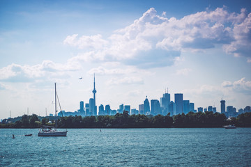 Fototapeta premium Toronto skyline with a beautiful blue sky with clouds, Toronto, Ontario, Canada