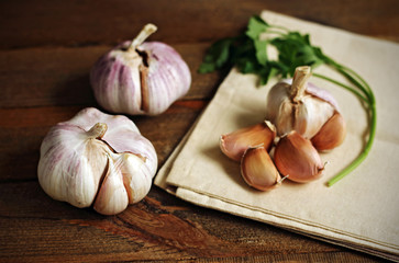 Fresh garlic on wooden board