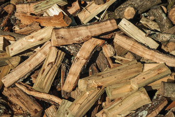 Detail of a pile of cut rustic wood