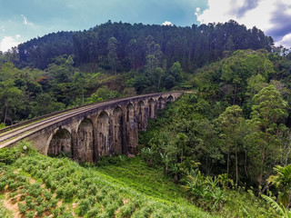 Nine Arch Bridge (Bridge in the Sky) is bridge in Sri Lanka. It is one of best examples of colonial-era railway construction in country. It is located in Demodara, between Ella and Demodara stations.
