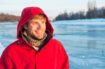 Feeling playful. winter male fashion. warm clothes for cold climate. weather forecast. human and...