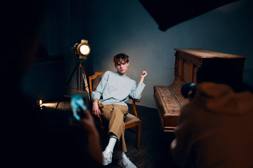 Fototapeta premium young man playing a guitar