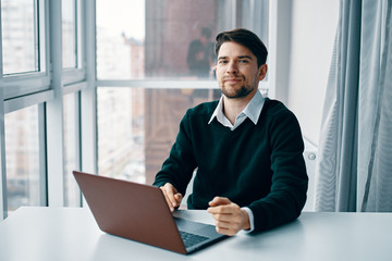businessman working on laptop in office
