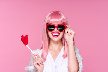 portrait of young woman with lollipop