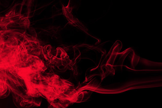 Fire of red smoke abstract on black background, darkness concept