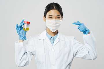 scientist in laboratory with test tubes