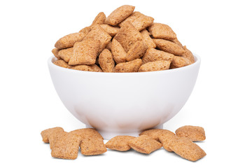 Cereal pillows dry breakfast in white bowl