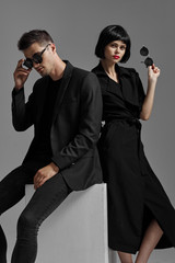 man and woman with gun