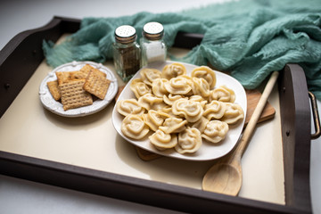 Russian pelmeni or meat dumplings, traditional family dish