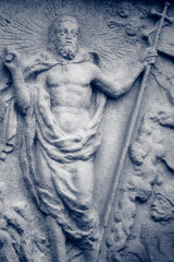 Fototapeta na wymiar Ancient statue of saint John with cross. Christianity ad religion concept.