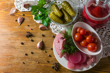 Different types of pickled vegetables. Pickled cucumbers, tomato, cabbage, pepper, greens, onion...