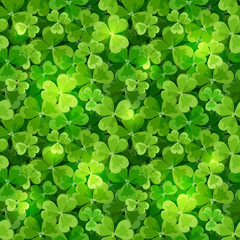 Vector St. Patrick's day seamless background texture with green shamrock leaves.