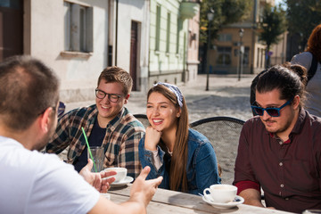 Group of friends enjoying in Coffee shop