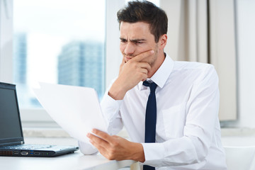 businessman working on his laptop in office